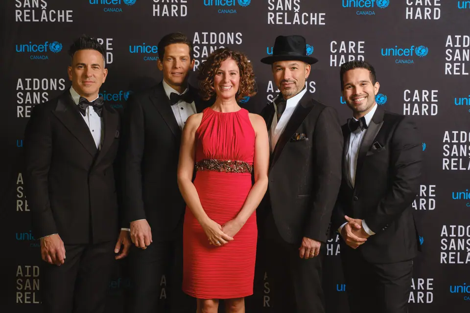 Performers posing on the red carpet at the UNICEF Glow for Good gala